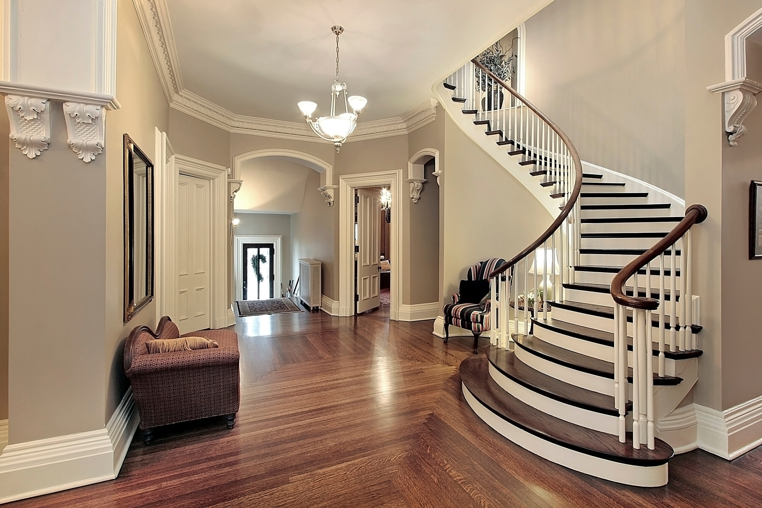 Foyer with curved staircase
